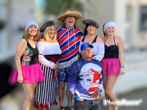 un grupo de personas vestidas con disfraces posando para una foto en Belle Dene Guest House, en Paignton