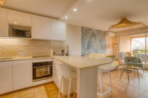 Kuchnia lub aneks kuchenny w obiekcie Bel appartement classé 3 étoiles