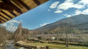 a view of a mountain from a bridge at Hotel Valle del Jerte in Jerte