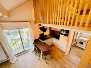 Kuchyňa alebo kuchynka v ubytovaní Charmant appartement idéalement situé
