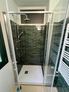 a shower with a glass enclosure in a bathroom at Casa Marta in Cava deʼ Tirreni