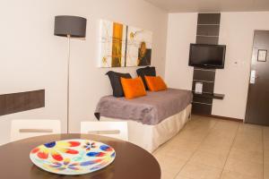 TV a/nebo společenská místnost v ubytování Kube Apartments Express