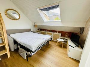 Posteľ alebo postele v izbe v ubytovaní Charmant appartement idéalement situé