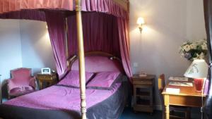 Postel nebo postele na pokoji v ubytování Hotel Le Clos du Montvinage