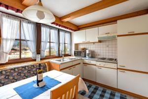 Kuchyň nebo kuchyňský kout v ubytování Haus Hammerer