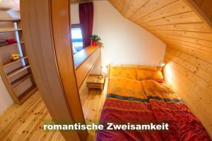 Postel nebo postele na pokoji v ubytování Wohlfühl-Ferienwohnung 80 qm, 8 Personen, Aussicht & Heimkino