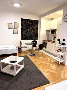 Kuchyň nebo kuchyňský kout v ubytování Apartments Mango Downtown
