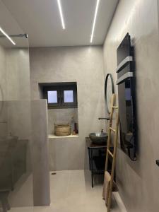A bathroom at Piedra Luxury Apartments
