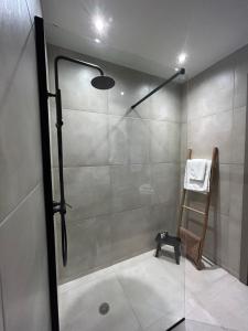 A bathroom at Piedra Luxury Apartments