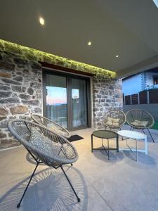 A patio or other outdoor area at Piedra Luxury Apartments
