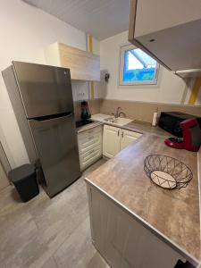 Kuchyňa alebo kuchynka v ubytovaní Maison avec jardin 4 à 5 personnes