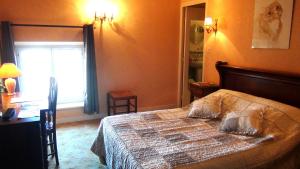Postel nebo postele na pokoji v ubytování Hotel Le Clos du Montvinage