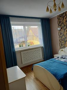 Postel nebo postele na pokoji v ubytování Apartamenty na skarpie