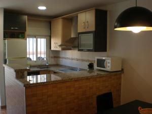 Kuchyňa alebo kuchynka v ubytovaní Apartamento Las Gaviotas