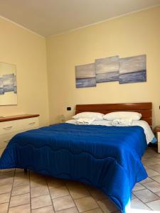 Кровать или кровати в номере Villa Gianna