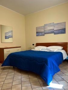 Кровать или кровати в номере Villa Gianna