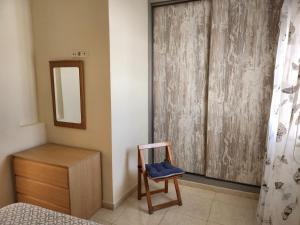 Postel nebo postele na pokoji v ubytování APARTAMENTO ÁTICO EN GÜÍMAR