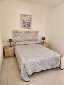 Postel nebo postele na pokoji v ubytování APARTAMENTO ÁTICO EN GÜÍMAR