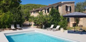 Bazén v ubytování Es Campet, charmante finca, Soller, Vue splendide, piscine, calme nebo v jeho okolí