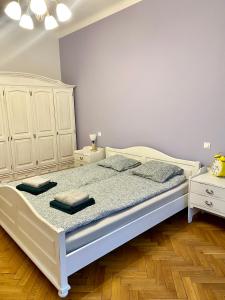 Katil atau katil-katil dalam bilik di Project Comfort Apartament Radna 13/8 Powiśle