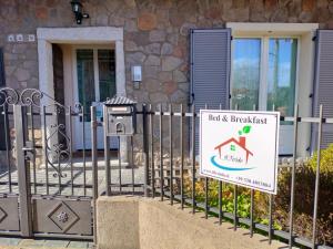 Certifikát, hodnocení, plakát nebo jiný dokument vystavený v ubytování B&B Il Feriolo