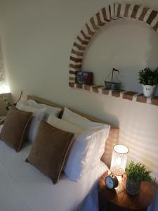 Posteľ alebo postele v izbe v ubytovaní casa di nonna