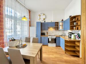 Kuchyň nebo kuchyňský kout v ubytování Laura´s Apartment