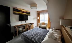 Voodi või voodid majutusasutuse Hotel Žabčice toas