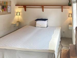 Postel nebo postele na pokoji v ubytování Holiday home Ljugarn II