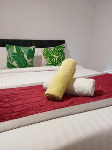 Ένα ή περισσότερα κρεβάτια σε δωμάτιο στο LondonRooms