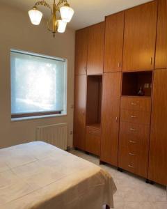 A bed or beds in a room at Villa Marina a breath away from the sea