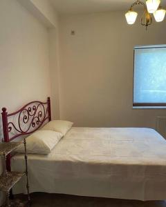 A bed or beds in a room at Villa Marina a breath away from the sea