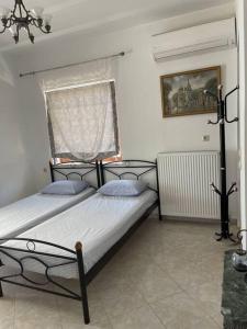 A bed or beds in a room at Villa Marina a breath away from the sea