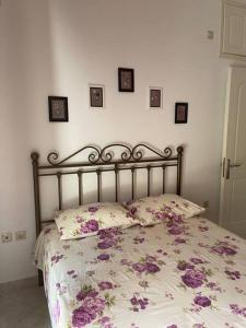 A bed or beds in a room at Villa Marina a breath away from the sea