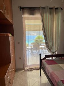 A bed or beds in a room at Villa Marina a breath away from the sea