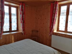 Łóżko lub łóżka w pokoju w obiekcie chalet Mont-Blanc