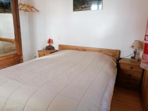 Łóżko lub łóżka w pokoju w obiekcie chalet Mont-Blanc