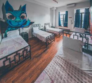 Postel nebo postele na pokoji v ubytování NY Moore Hostel