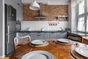 Kuchyň nebo kuchyňský kout v ubytování Apartament Roxy Q4Apartments + 20 fotografií