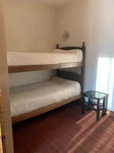 Postel nebo postele na pokoji v ubytování motel