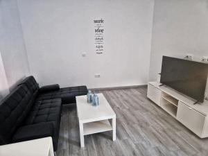 Telewizja i/lub zestaw kina domowego w obiekcie Apartamento mi currilla