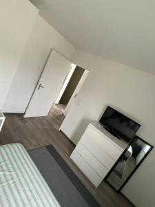 Televízia a/alebo spoločenská miestnosť v ubytovaní Belle maison neuve à 5 mn de la plage + 17 fotografií