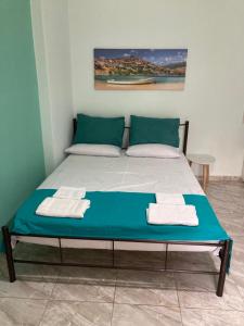 A bed or beds in a room at valantis room