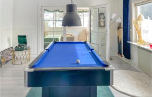a pool table in the middle of a living room at 3 Bedroom Nice Home In Lunde in Lunde