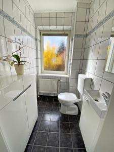 Ein Badezimmer in der Unterkunft Jacky & Daniel's Apartments Top 1