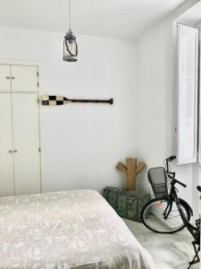 Postel nebo postele na pokoji v ubytování El Rinconcito - apartamento palacete rehabilitado