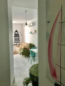 Posezení v ubytování El Rinconcito - apartamento palacete rehabilitado