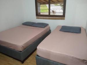 Postel nebo postele na pokoji v ubytování Cabaña la palma + 35 fotografií
