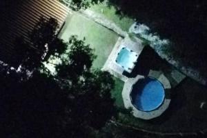 Bazén v ubytování Cabaña la palma nebo v jeho okolí