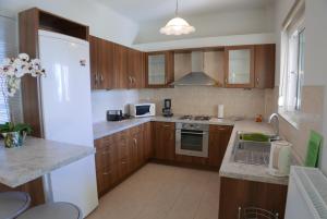 Kuchyňa alebo kuchynka v ubytovaní Renting House GALINI